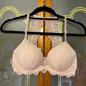 Pink Victoria’s Secret size 34D Front closure bra. Pinkish/nude color